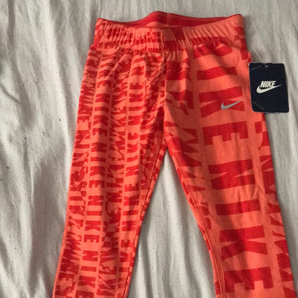 Peach Nike mid way leggings